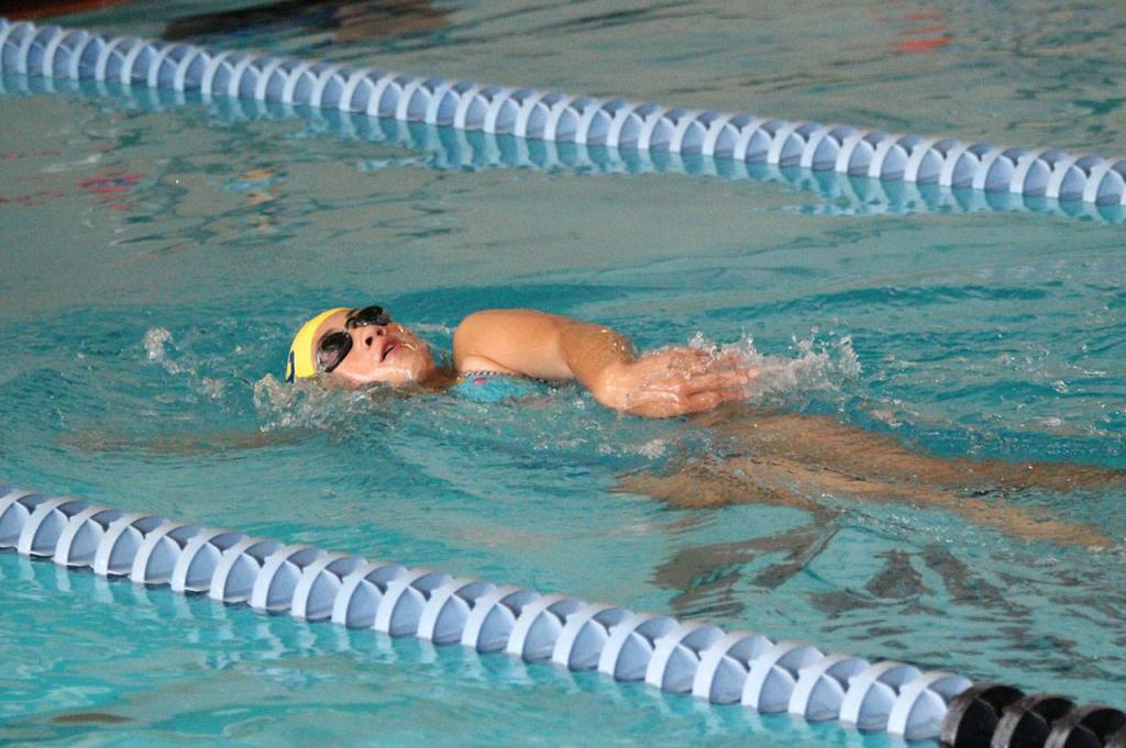 Caitlin Dennen works on her backstroke. (Photo by Jim Waller/Whidbey News-Times)
