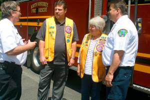 Lions give fire department $10,000