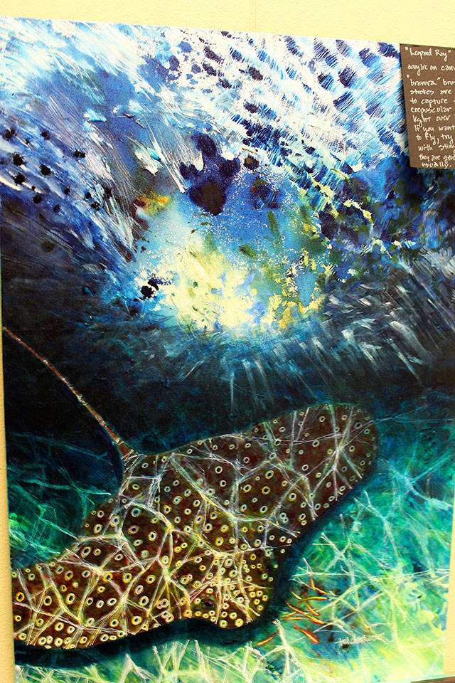 This painting showing a leopard whipray is one of many seascapes found in Tina Christiansen&rsquo;s art. Photo by Patricia Guthrie/Whidbey News-Times