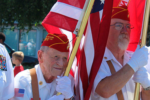 Veterans carried the colors of the flags and led the way for military marchers.