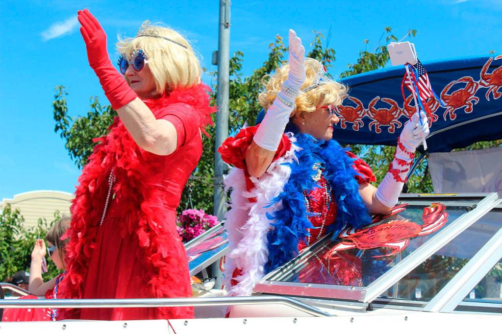 Called &ldquo;Oak Harbor&rsquo;s Most Popular Ambassadors,&rdquo; the Crab Ladies perfected the royal wave as they rolled on by.