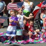 Kids enthusiastically waved flags throughout the nearly two-hour parade. Photos by Patricia Guthrie/Whidbey News-Times