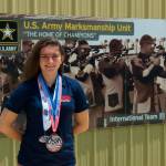 Elana Flake shows off her medals from the USA Shooting Champioships. (Submitted photo)