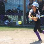 Desiree Becherer slaps at a pitch in Saturday&rsquo;s game. (Photo by Jim Waller/Whidbey News-Times)