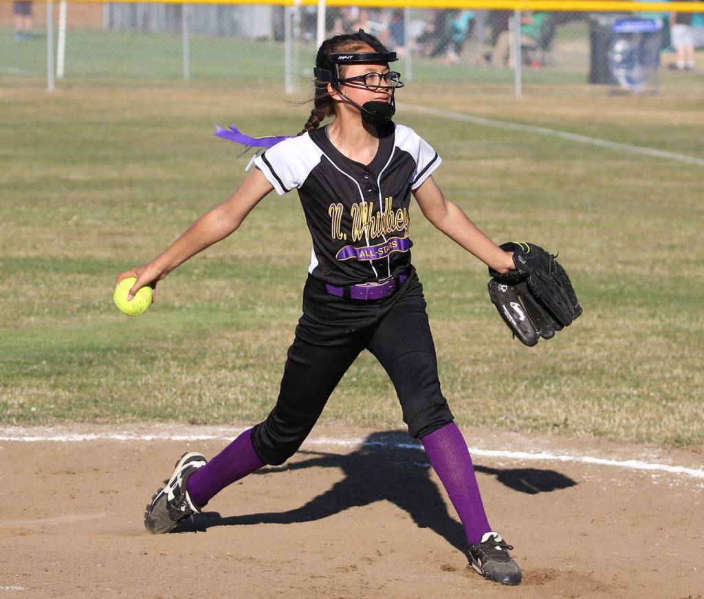 Jadyn Erickson pitches in relief for North Whidbey. (Photo by John Fisken)
