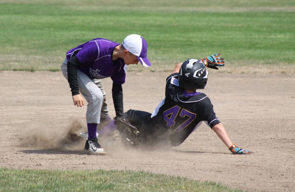 Taryn Hardy slides into second base. (Photo by Jim Waller/Whidbey News-Times)