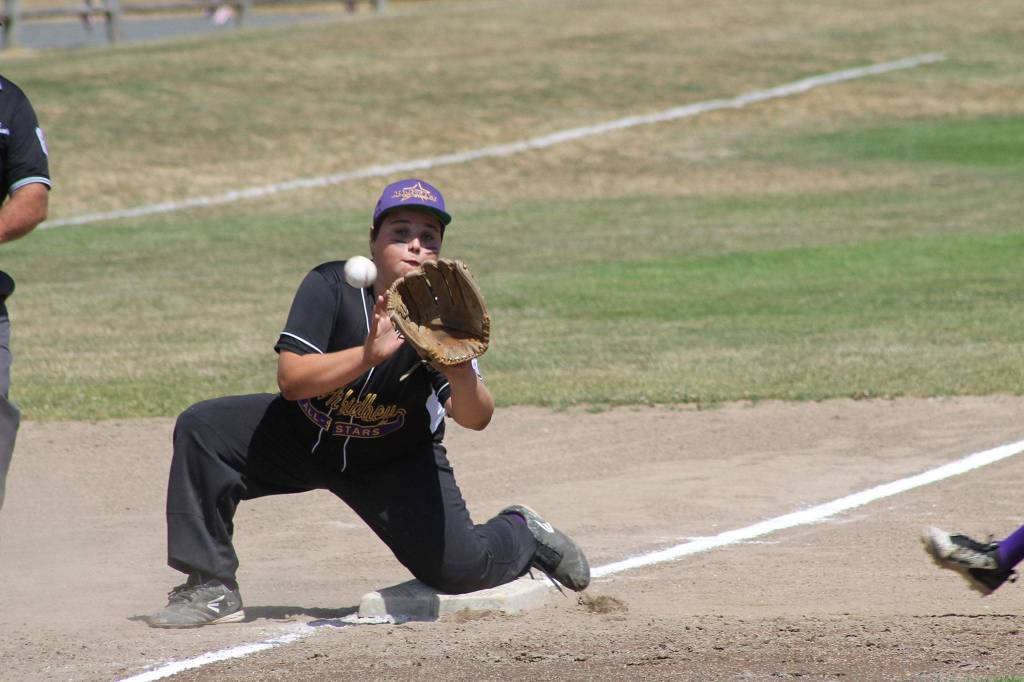 Shane Hoffmire snares a throw at third base. (Photo by Jim Waller/Whidbey News-Times)
