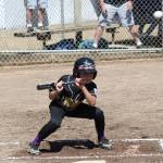 Alex Jenkins ducks out of the way of a high pitch. (Photo by Jim Waller/Whidbey News-Times)