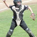 Nate Moore throws to first after fielding a swinging bunt. (Photo by Jim Waller/Whidbey News-Times)