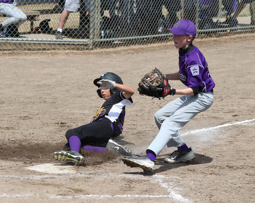 Chris Shashaty adds to the North Whidbey run total. (Photo by Jim Waller/Whidbey News-Times)