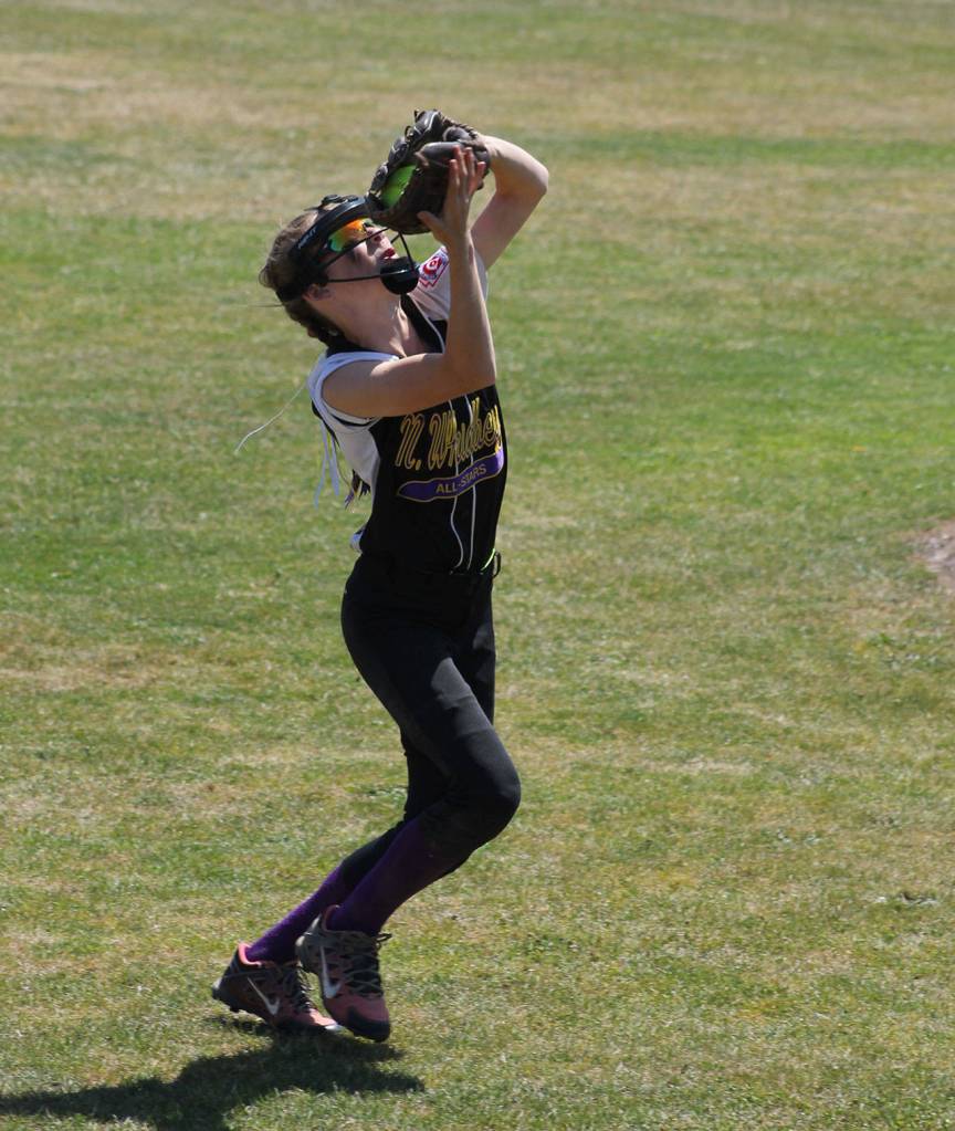 Shortstop Emily Wilson snags a pop-up. (Photo by Jim Waller/Whidbey News-Times)