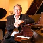 Lloyd Boyd has become Whidbey&rsquo;s Piano Man following the death of his brother, Ronald Boyd, who stored his collection of Steinways and other rebuilt grand pianos in Greenbank. Photo by Kevin Clark/The Herald