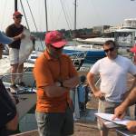 Rick Almberg, left, Allen Wilson, Bill Weinsheimer, Jason Polly and Dave Steckman discus the race course. (Photo by Bill Walker)