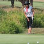 Jane Behrman watches as her putt rolls near the hole. (Photo by Jim Waller/Whidbey News-Times)
