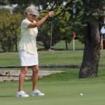 Cindy Campbell lines up a putt Friday. (Photo by Jim Waller/Whidbey News-Times)