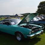 This 1977 Ford Maverick, owned by Jordan Paiz, is displayed among other cars in its division at the North Whidbey Car Show Saturday. The show featured 233 vehicles across 21 categories. Photo by Laura Guido/Whidbey News-Times