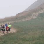 Runners jog through the fog on the bluff trail Saturday. (Photo by Jim Waller/WhidbeyNews-Times)