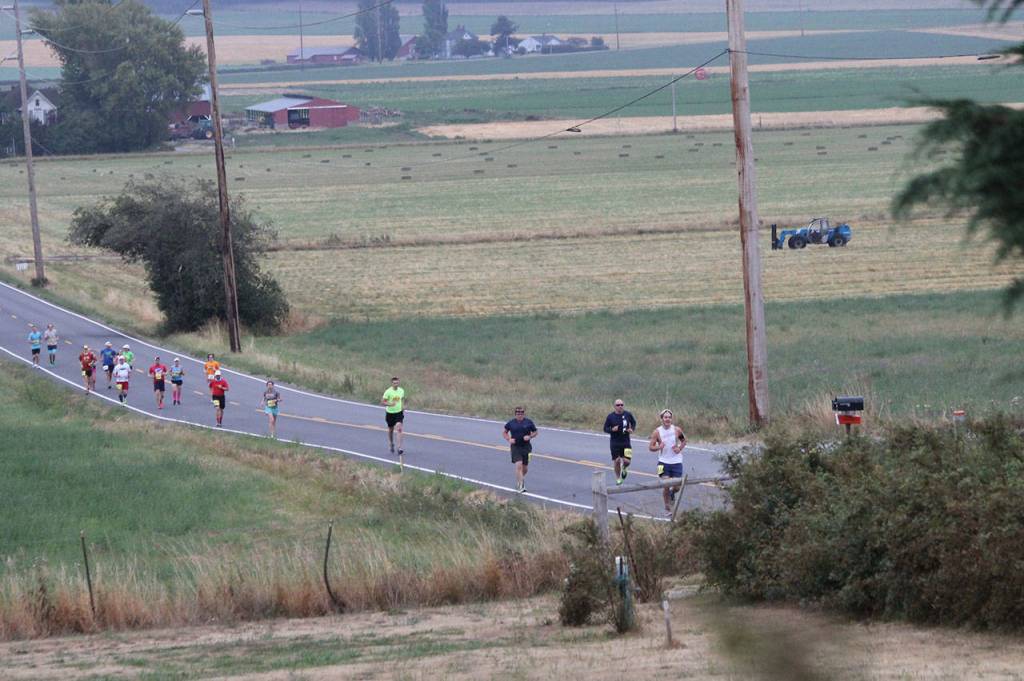 Marathoners head up Cook Road. (Photo by Jim Waller/Whidbey News-Times)