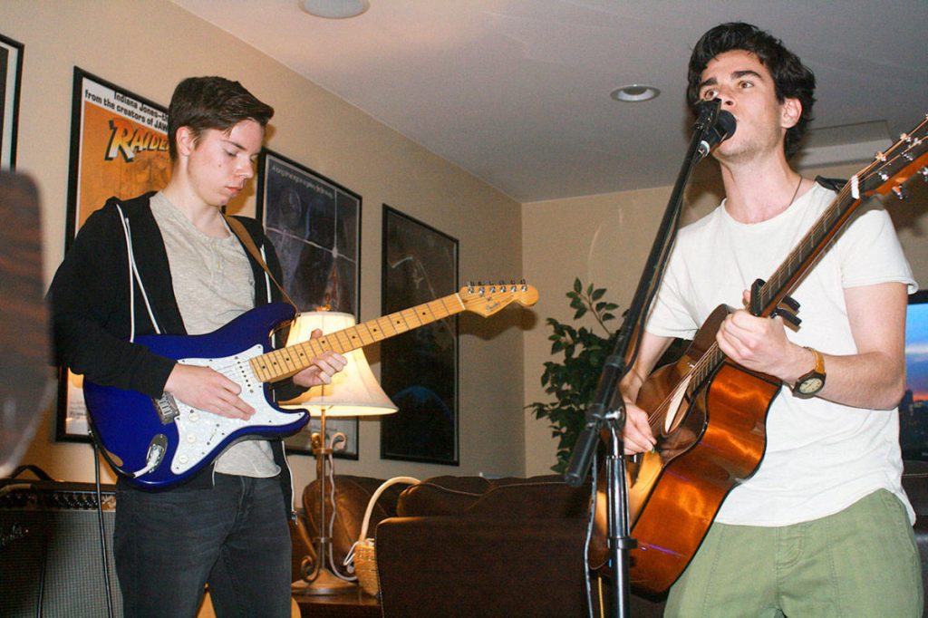 Jourdan Wallace (left) and Tyler Grehan lead the band Backyard Bison. The local teens were selected as one of 39 acts performing at Oak Harbor Musical Festival. Photo by Daniel Warn/Whidbey News-Times