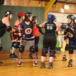 Roller Girls hold scrimmage / Roller derby