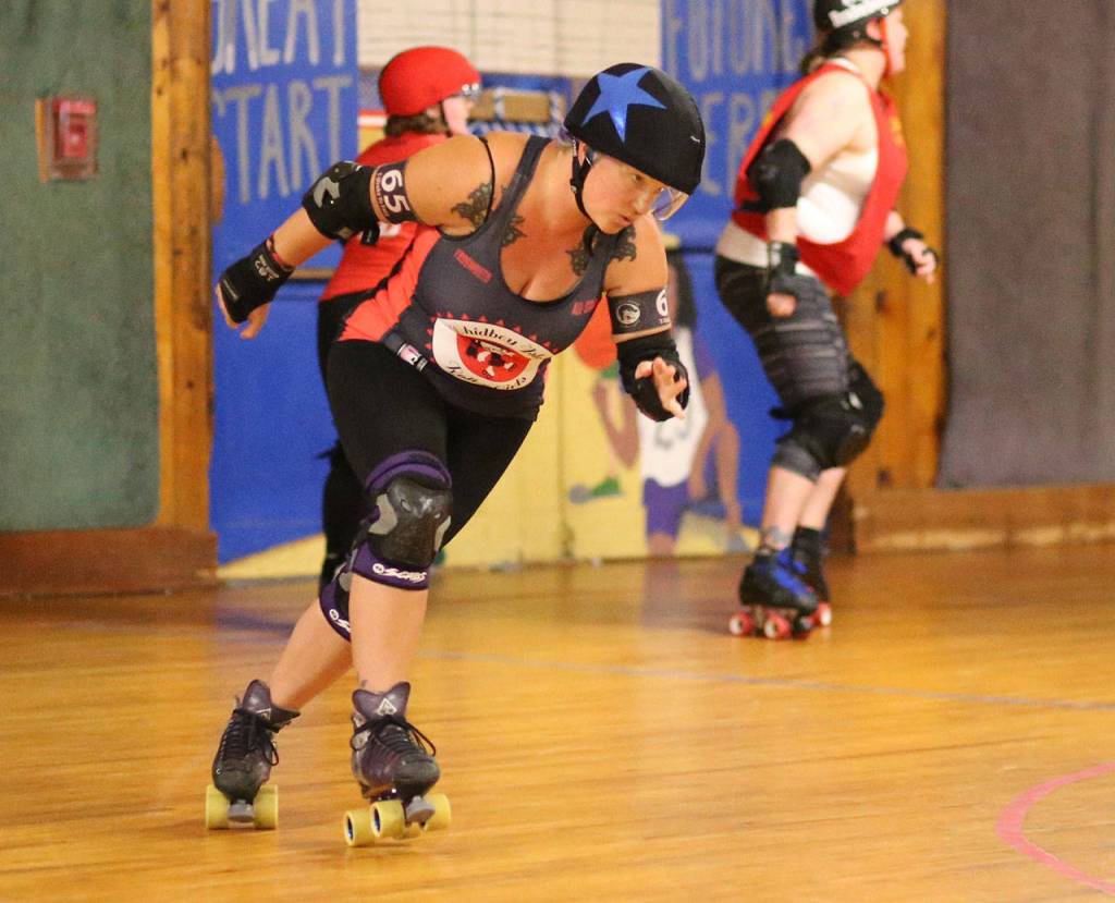 Roller Girls hold scrimmage / Roller derby
