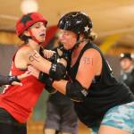 Roller Girls hold scrimmage / Roller derby