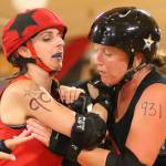 Roller Girls hold scrimmage / Roller derby