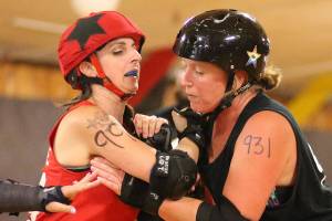 Roller Girls hold scrimmage / Roller derby