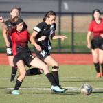 Coupeville&rsquo;s Mallory Kortuem, left, challenges a South Whidbey player. (Photo by John Fisken)