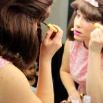 Erin Pitts becomes pretty in pink before a preview show of Beehive last week. Opening is 7:30 p.m. Friday.