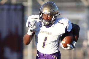 Wildcats trample Marauders 34-12 / Football