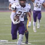Mac Nuanez races for a 44-yard TD. Nuanez finished with 163 rushing yards and three touchdowns. (Photo by John Fisken)