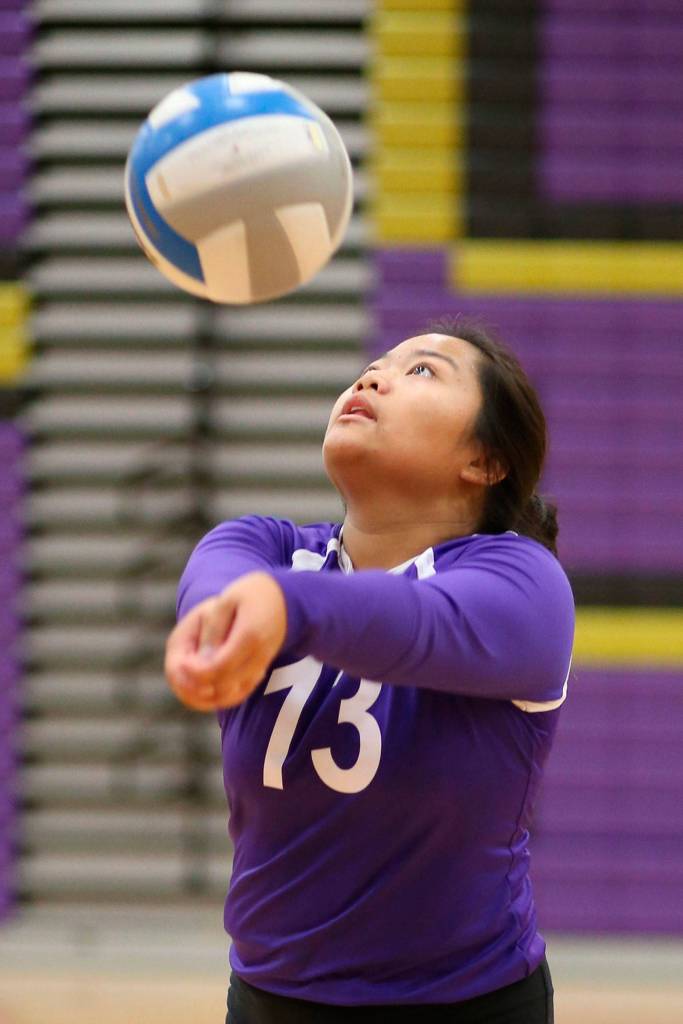 Oak Harbor&rsquo;s Andrea Ruben passes for the Wildcats. (Photo by John Fisken)