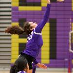 Kristina Tirado goes for a kill for the Wildcats. (Photo by John Fisken)