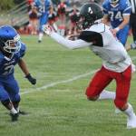 Coupeville&rsquo;s Hunter Smith tries to get by Alex Black (2). (Photo by Evan Thompson/Whidbey News Group)