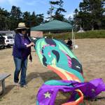 Kyle Jensen / The Record &mdash; Lake Stevens resident Mari Daniels prepares her handmade dragon kite to take flight.