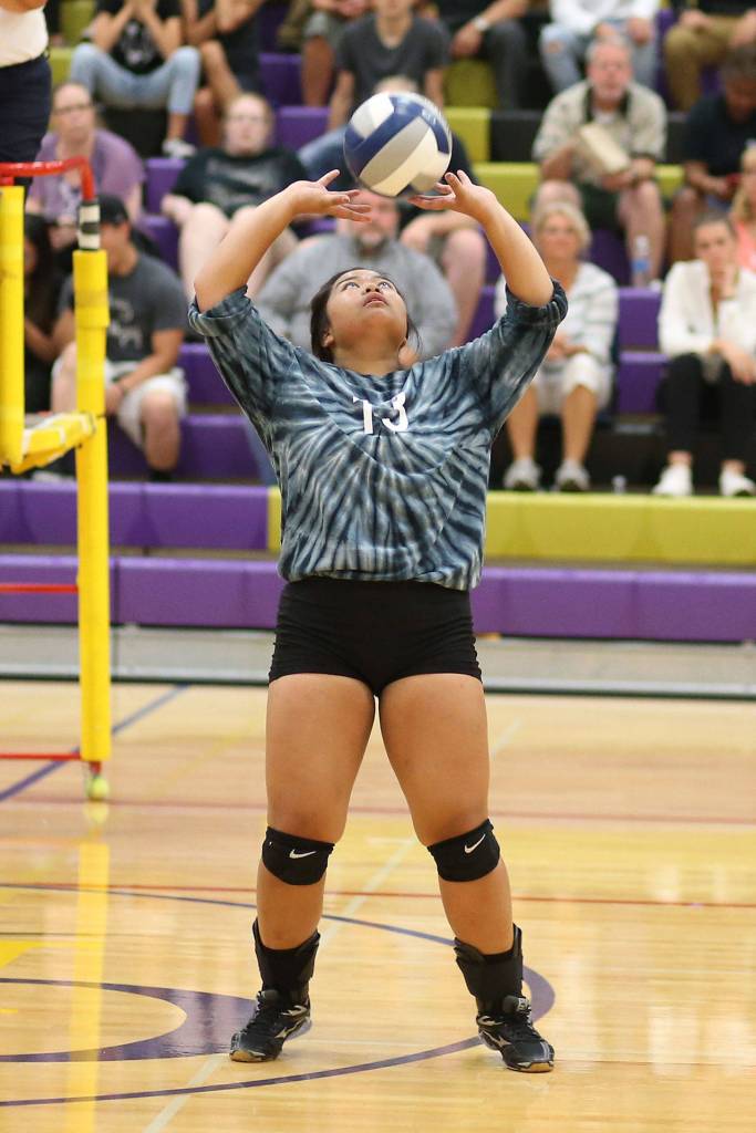 Andrea Ruben sets for Oak Harbor in the Ferndale match. (Photo by John Fisken)