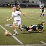 Breanna Scheppler leaves a Mount Vernon player in her wake. (Photo by John Fisken)