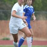 Lindsey Roberts dribbles up the field for the Wolves. (Photo by John Fisken)