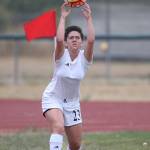 Lily Zustiak inbounds the ball in Coupeville&rsquo;s match Saturday. (Photo by John Fisken)