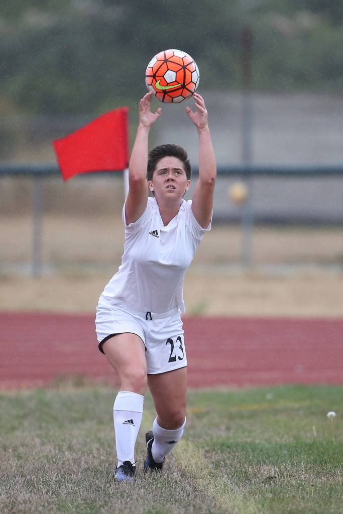 Lily Zustiak inbounds the ball in Coupeville&rsquo;s match Saturday. (Photo by John Fisken)