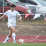Mallory Kortuem looks to pass to a Coupeville teammate. (Photo by John Fisken)
