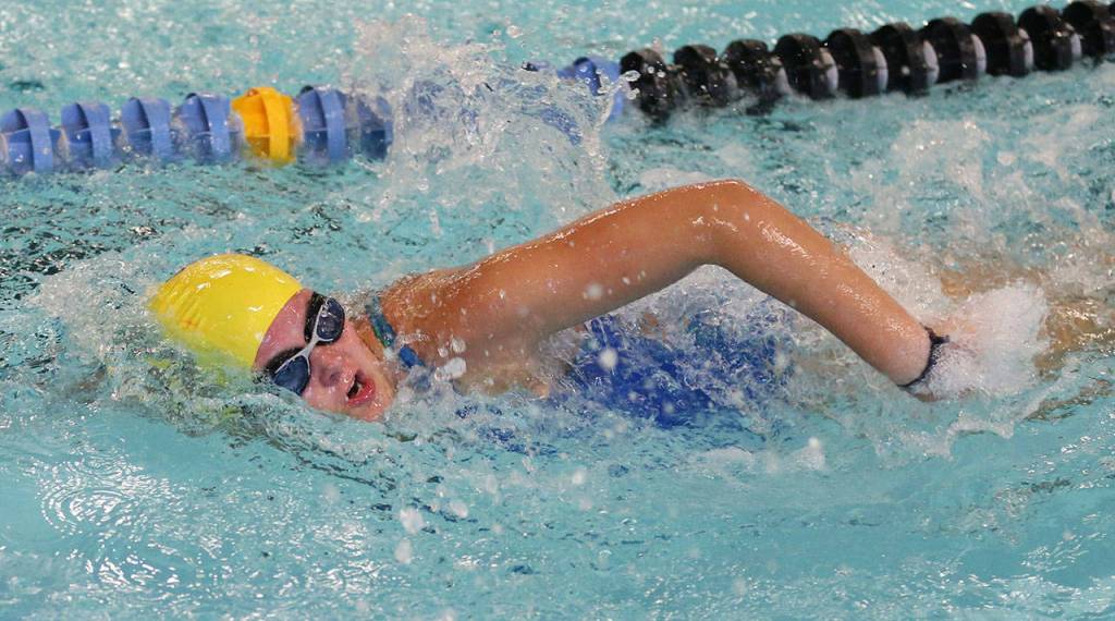 Italian exchange student Lavinia Liatti places third in the 100 freestyle for the Wildcats. (Photo by John Fisken)