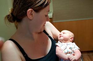 Whidbey News Group file &mdash; Teagan Rose Vogt was the first patient, and newborn, in the new addition of WhidbeyHealth Medical Center that opened in July. She is held by her mother, Alicia Vogt.