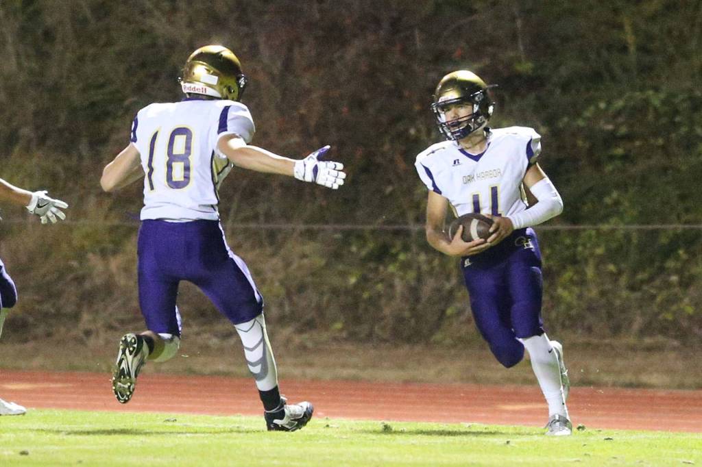 Will Danielson (18) and Jordan Bell (4)