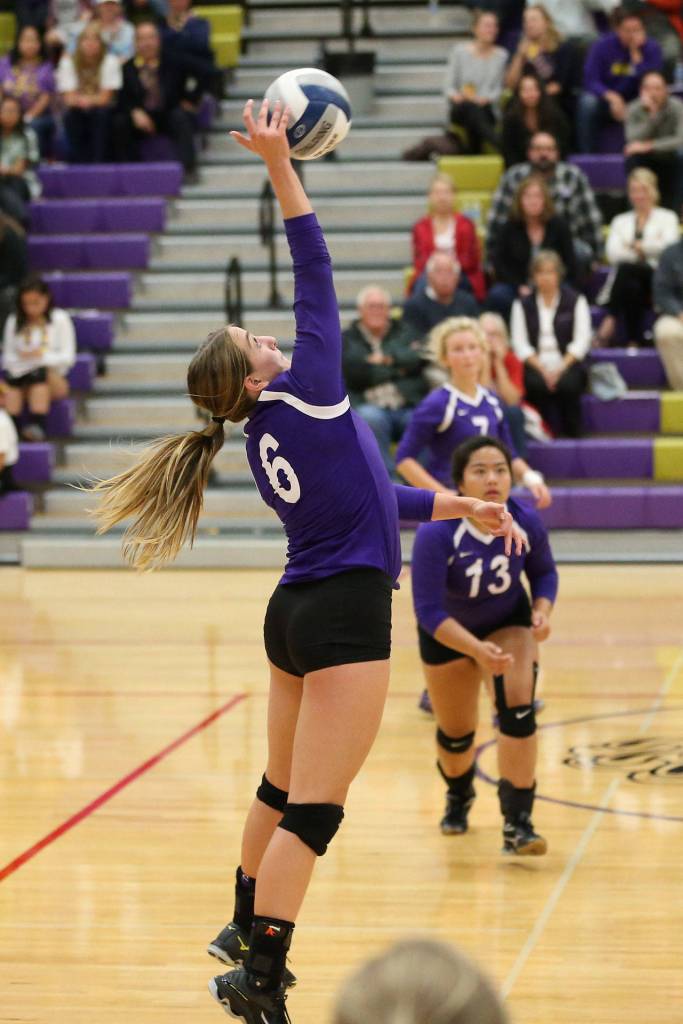 Samantha Hines hits for Oak Harbor. (Photo by John Fisken)