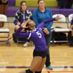 Wildcat Jaslin Webster fires a jump serve against Stanwood. (Photo by John Fisken)