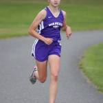 Oak Harbor&rsquo;s Alex Smith leads the field in the girls race Thursday. (Photo by John Fisken)