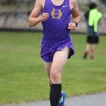 Ben Gasper pulls away in his win in the boys race. (Photo by John Fisken)
