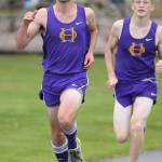 Oak Harbor&rsquo;s Tyler Grehan and Dallas Riddle-Stevens run mid-course in the boys race. Riddle-Stevens eventually finished second and Grehan fourth. (Photo by John Fisken)